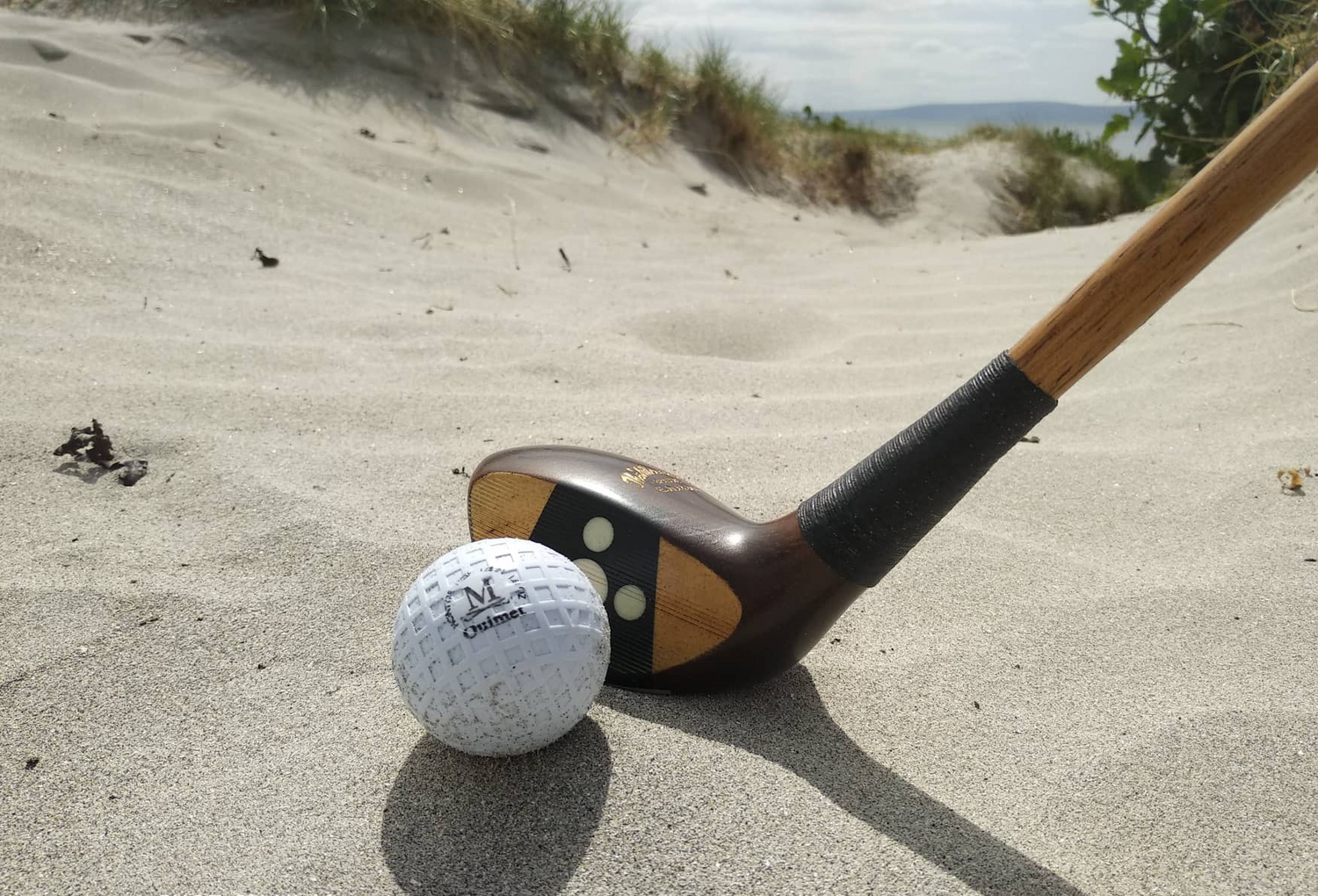 Wilsonian Brassie and Ouimet replica ball on the beach