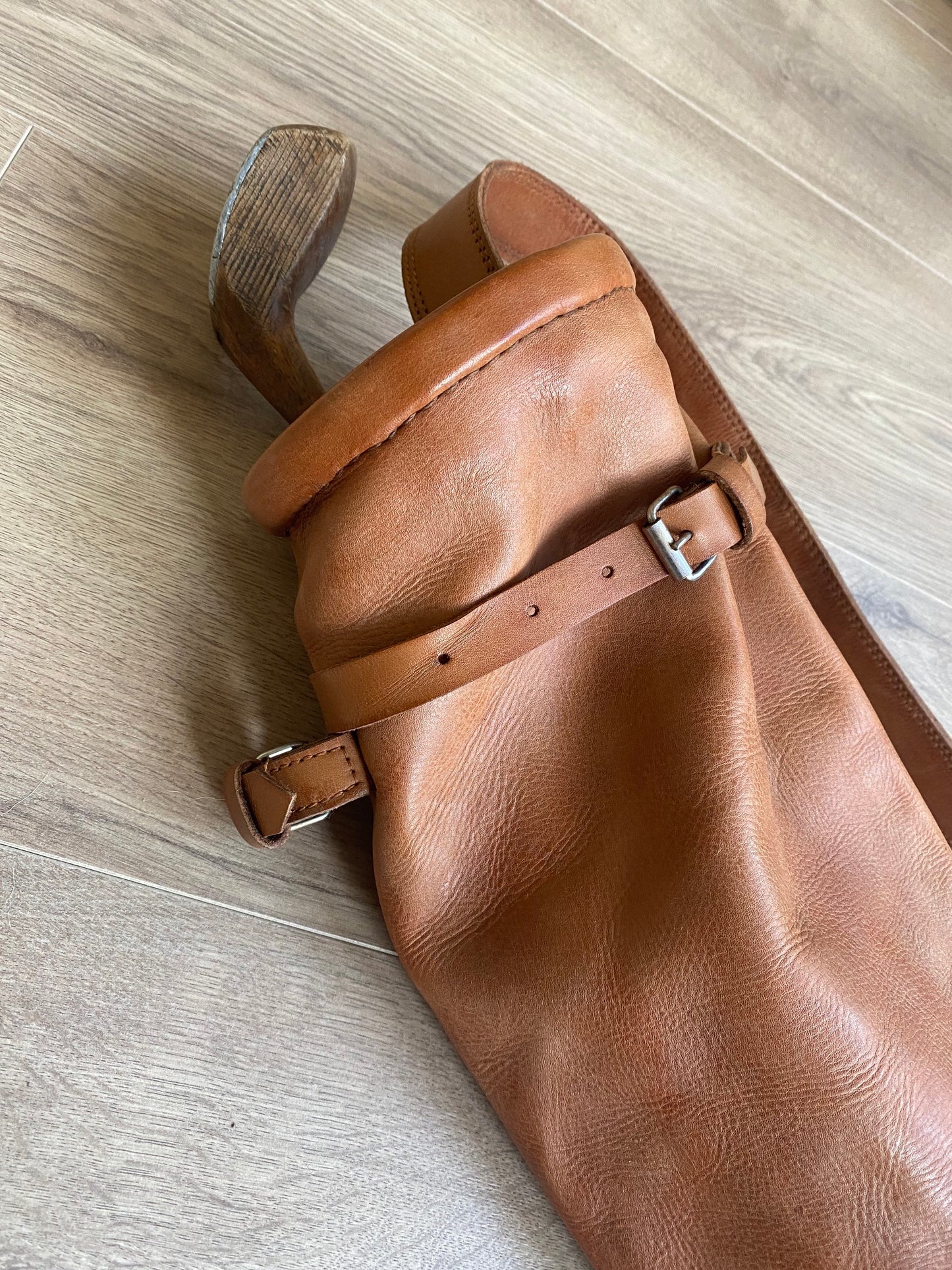 Handcrafted vintage leather golf bag in tan color with shoulder strap