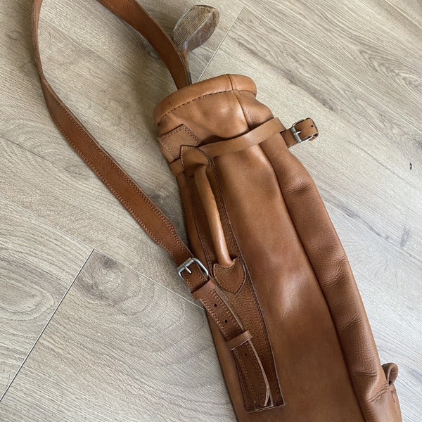 Handcrafted vintage leather golf bag in tan color with shoulder strap